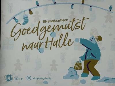 Branding of a 20FT showroom container at the Christmas market in Halle, Flanders with a view of the historic town hall.